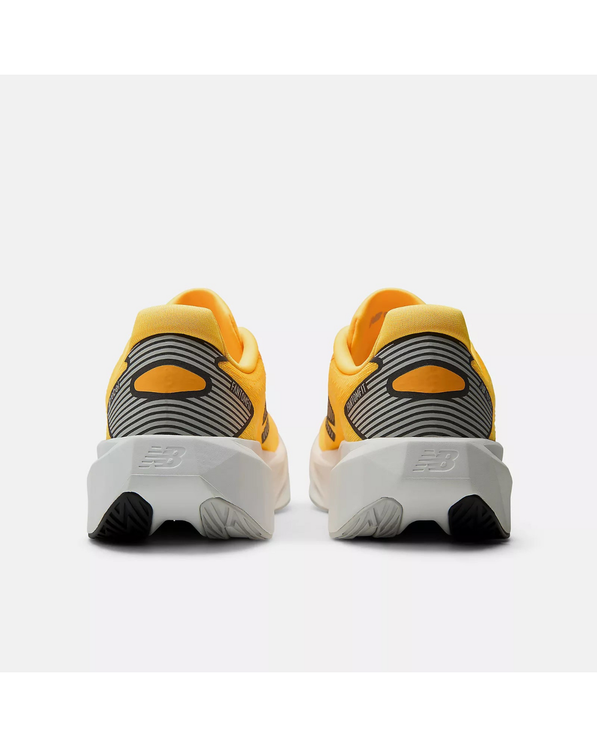 New Balance Women's FuelCell Rebel v5 - SATSUMA ORANGE / GREY MATTER