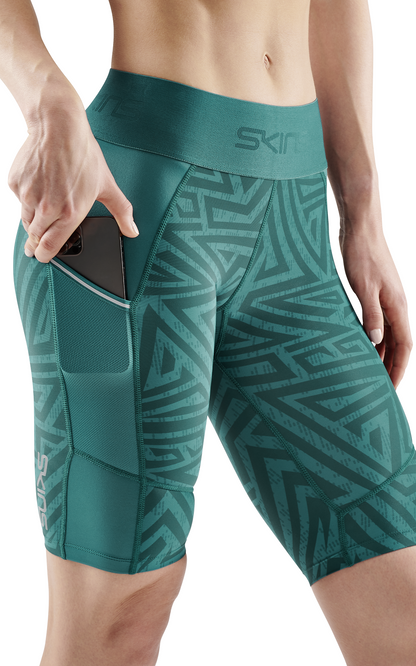 SKINS Women's Compression Half Tights 3-Series - Lt. Teal Angle